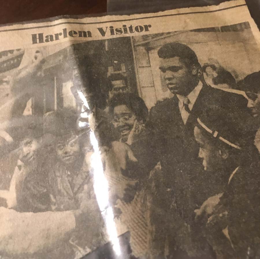 J Bailey Morgan meets Muhammed Ali outside the Apollo Theater in early 1971. 